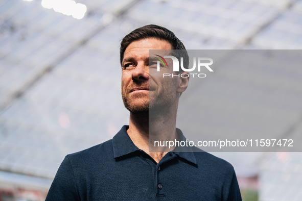 Xabi Alonso, Head Coach of Bayer 04 Leverkusen, looks on prior to the Bundesliga match between Bayer 04 Leverkusen and VfL Wolfsburg at Bay...