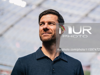 Xabi Alonso, Head Coach of Bayer 04 Leverkusen, looks on prior to the Bundesliga match between Bayer 04 Leverkusen and VfL Wolfsburg at Bay...