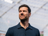 Xabi Alonso, Head Coach of Bayer 04 Leverkusen, looks on prior to the Bundesliga match between Bayer 04 Leverkusen and VfL Wolfsburg at Bay...