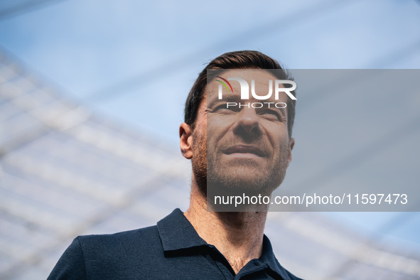 Xabi Alonso, Head Coach of Bayer 04 Leverkusen, looks on prior to the Bundesliga match between Bayer 04 Leverkusen and VfL Wolfsburg at Bay...