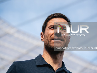 Xabi Alonso, Head Coach of Bayer 04 Leverkusen, looks on prior to the Bundesliga match between Bayer 04 Leverkusen and VfL Wolfsburg at Bay...