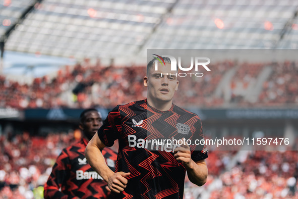 Florian Wirtz of Bayer 04 Leverkusen looks on prior to the Bundesliga match between Bayer 04 Leverkusen and VfL Wolfsburg at Bay Arena in Le...