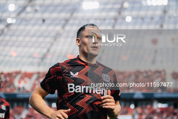 Florian Wirtz of Bayer 04 Leverkusen looks on prior to the Bundesliga match between Bayer 04 Leverkusen and VfL Wolfsburg at Bay Arena in Le...