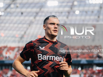 Florian Wirtz of Bayer 04 Leverkusen looks on prior to the Bundesliga match between Bayer 04 Leverkusen and VfL Wolfsburg at Bay Arena in Le...