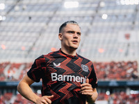 Florian Wirtz of Bayer 04 Leverkusen looks on prior to the Bundesliga match between Bayer 04 Leverkusen and VfL Wolfsburg at Bay Arena in Le...