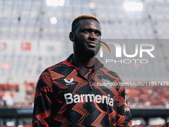 Victor Boniface of Bayer 04 Leverkusen looks on prior to the Bundesliga match between Bayer 04 Leverkusen and VfL Wolfsburg at Bay Arena in...