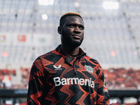 Victor Boniface of Bayer 04 Leverkusen looks on prior to the Bundesliga match between Bayer 04 Leverkusen and VfL Wolfsburg at Bay Arena in...