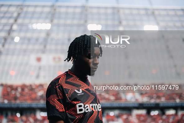 Jeremie Frimpong of Bayer 04 Leverkusen looks on prior to the Bundesliga match between Bayer 04 Leverkusen and VfL Wolfsburg at Bay Arena in...