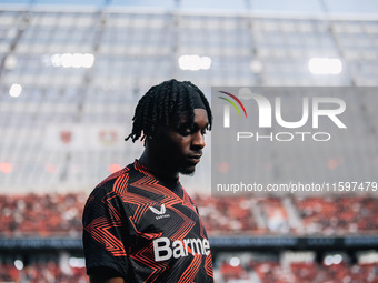 Jeremie Frimpong of Bayer 04 Leverkusen looks on prior to the Bundesliga match between Bayer 04 Leverkusen and VfL Wolfsburg at Bay Arena in...