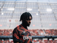 Jeremie Frimpong of Bayer 04 Leverkusen looks on prior to the Bundesliga match between Bayer 04 Leverkusen and VfL Wolfsburg at Bay Arena in...