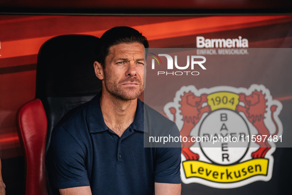 Xabi Alonso, Head Coach of Bayer 04 Leverkusen, looks on prior to the Bundesliga match between Bayer 04 Leverkusen and VfL Wolfsburg at Bay...