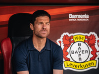 Xabi Alonso, Head Coach of Bayer 04 Leverkusen, looks on prior to the Bundesliga match between Bayer 04 Leverkusen and VfL Wolfsburg at Bay...