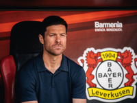 Xabi Alonso, Head Coach of Bayer 04 Leverkusen, looks on prior to the Bundesliga match between Bayer 04 Leverkusen and VfL Wolfsburg at Bay...