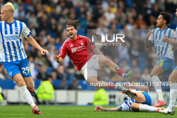 Jota Silva of Nottingham Forest gets tackled during the Premier League match between Brighton and Hove Albion and Nottingham Forest at the A...