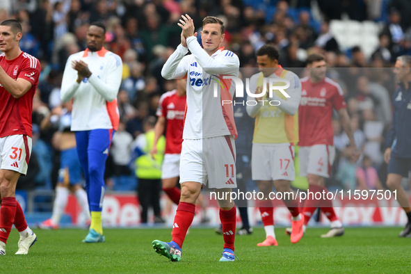 Chris Wood of Nottingham Forest applauds his team's supporters during the Premier League match between Brighton and Hove Albion and Nottingh...