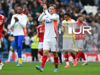 Chris Wood of Nottingham Forest applauds his team's supporters during the Premier League match between Brighton and Hove Albion and Nottingh...