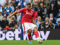 Murillo of Nottingham Forest plays the ball forward during the Premier League match between Brighton and Hove Albion and Nottingham Forest a...