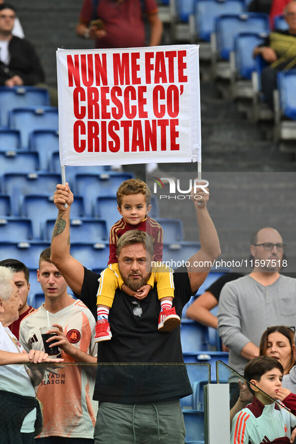 Supporters of A.S. Roma during the 5th day of the Serie A Championship between A.S. Roma and Udinese Calcio at the Olympic Stadium in Rome,...