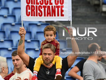 Supporters of A.S. Roma during the 5th day of the Serie A Championship between A.S. Roma and Udinese Calcio at the Olympic Stadium in Rome,...