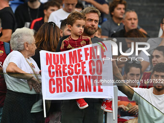 Supporters of A.S. Roma during the 5th day of the Serie A Championship between A.S. Roma and Udinese Calcio at the Olympic Stadium in Rome,...