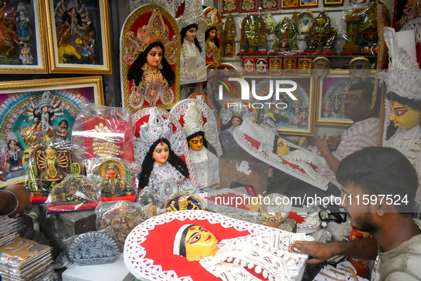 Artists make decorations for the Hindu goddess Durga inside a shop ahead of the Durga Puja festival in Kolkata, India, on September 22, 2024...