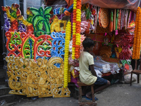 A boy sells decorations for the Durga Puja festival in Kolkata, India, on September 22, 2024. (