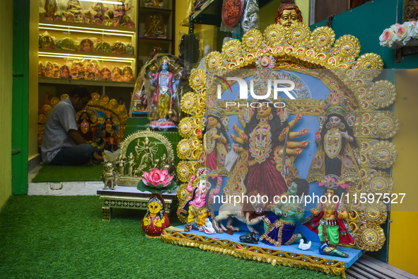 Idol makers display Durga idols outside a workshop for sale ahead of the Durga Puja festival in Kolkata, India, on September 22, 2024. 