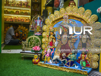 Idol makers display Durga idols outside a workshop for sale ahead of the Durga Puja festival in Kolkata, India, on September 22, 2024. (