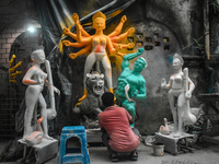 An idol maker makes a Durga idol inside a workshop ahead of the Durga Puja festival in Kolkata, India, on September 22, 2024. (