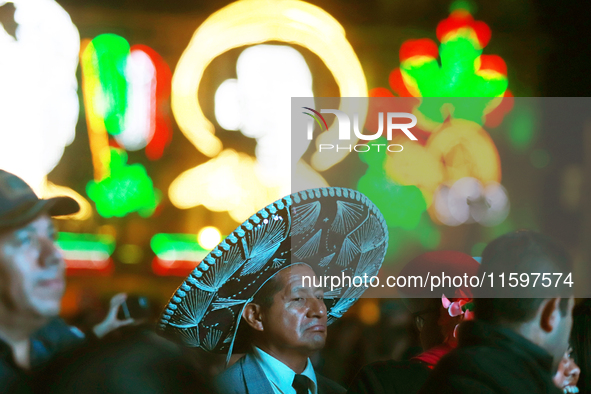 A person wears a Mariachi hat during the Maraton de Mariachis de la Ciudad de Mexico at Zocalo main square, which aims to promote and dissem...