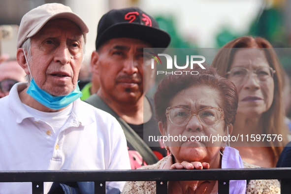 Persons are seen during the Maraton de Mariachis de la Ciudad de Mexico at Zocalo main square, which aims to promote and disseminate this re...