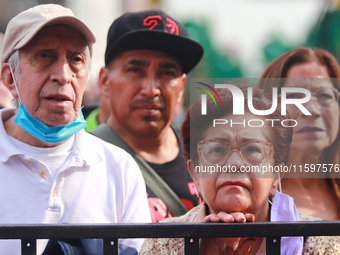 Persons are seen during the Maraton de Mariachis de la Ciudad de Mexico at Zocalo main square, which aims to promote and disseminate this re...