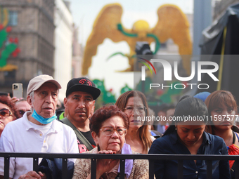 Persons are seen during the Maraton de Mariachis de la Ciudad de Mexico at Zocalo main square, which aims to promote and disseminate this re...