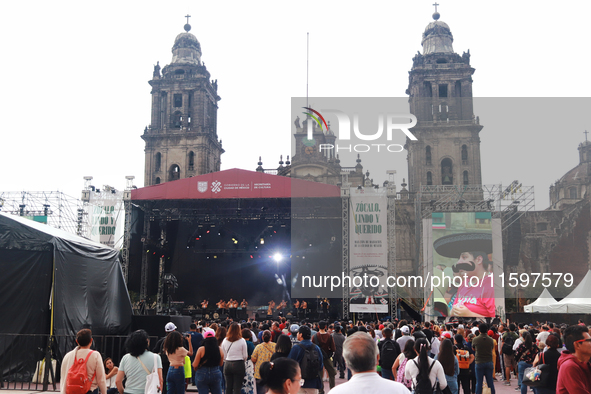 Persons are seen during the Maraton de Mariachis de la Ciudad de Mexico at Zocalo main square, which aims to promote and disseminate this re...