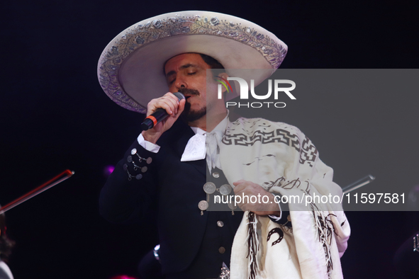 Rafael Jorge Negrete performs during the Maraton de Mariachis de la Ciudad de Mexico at Zocalo main square, which aims to promote and dissem...