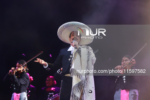 Rafael Jorge Negrete performs during the Maraton de Mariachis de la Ciudad de Mexico at Zocalo main square, which aims to promote and dissem...