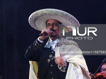 Rafael Jorge Negrete performs during the Maraton de Mariachis de la Ciudad de Mexico at Zocalo main square, which aims to promote and dissem...