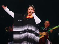 Vivir Quintana with Mariachi Mexicana Hermosa performs during the Maraton de Mariachis de la Ciudad de Mexico at Zocalo main square, whose o...