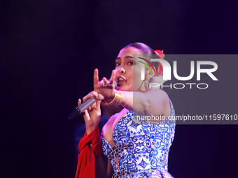 Valeria Cuevas with the Mariachi Real de la Montana performs during the Maraton de Mariachis de la Ciudad de Mexico at Zocalo main square, w...