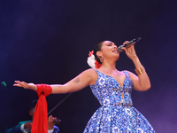 Valeria Cuevas with the Mariachi Real de la Montana performs during the Maraton de Mariachis de la Ciudad de Mexico at Zocalo main square, w...