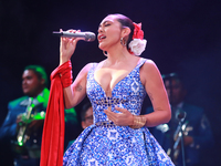 Valeria Cuevas with the Mariachi Real de la Montana performs during the Maraton de Mariachis de la Ciudad de Mexico at Zocalo main square, w...