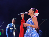 Valeria Cuevas with the Mariachi Real de la Montana performs during the Maraton de Mariachis de la Ciudad de Mexico at Zocalo main square, w...