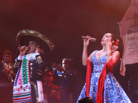 Valeria Cuevas with the Mariachi Real de la Montana performs during the Maraton de Mariachis de la Ciudad de Mexico at Zocalo main square, w...