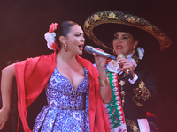 Valeria Cuevas with the Mariachi Real de la Montana performs during the Maraton de Mariachis de la Ciudad de Mexico at Zocalo main square, w...