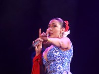 Valeria Cuevas with the Mariachi Real de la Montana performs during the Maraton de Mariachis de la Ciudad de Mexico at Zocalo main square, w...