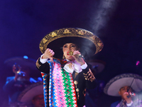 Aida Cuevas with the Mariachi Real de la Montana performs during the Maraton de Mariachis de la Ciudad de Mexico at Zocalo main square, whos...