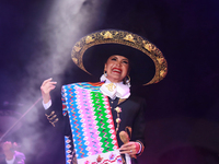 Aida Cuevas with the Mariachi Real de la Montana performs during the Maraton de Mariachis de la Ciudad de Mexico at Zocalo main square, whos...