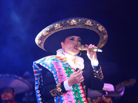 Aida Cuevas with the Mariachi Real de la Montana performs during the Maraton de Mariachis de la Ciudad de Mexico at Zocalo main square, whos...