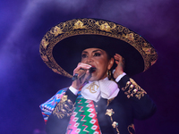 Aida Cuevas with the Mariachi Real de la Montana performs during the Maraton de Mariachis de la Ciudad de Mexico at Zocalo main square, whos...