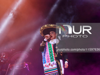 Aida Cuevas with the Mariachi Real de la Montana performs during the Maraton de Mariachis de la Ciudad de Mexico at Zocalo main square, whos...